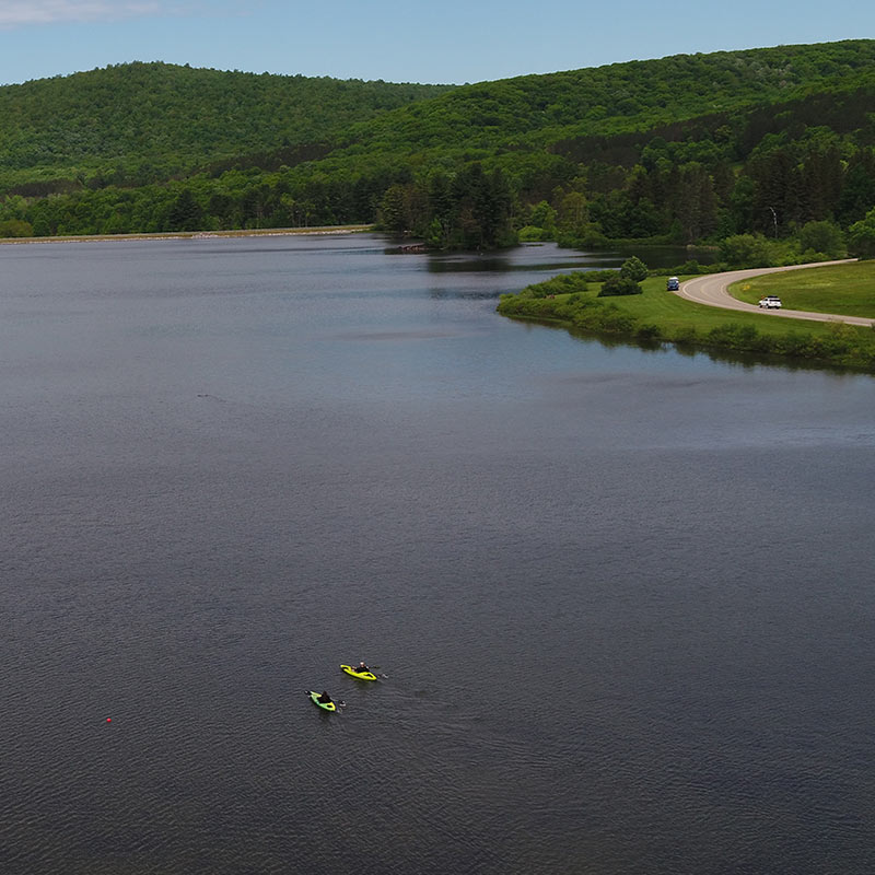 Kayakers traveling through Quaker Lake.